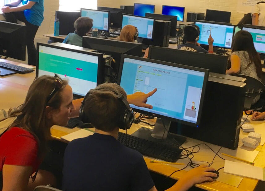 students using MathSpring online math tutor on school computers